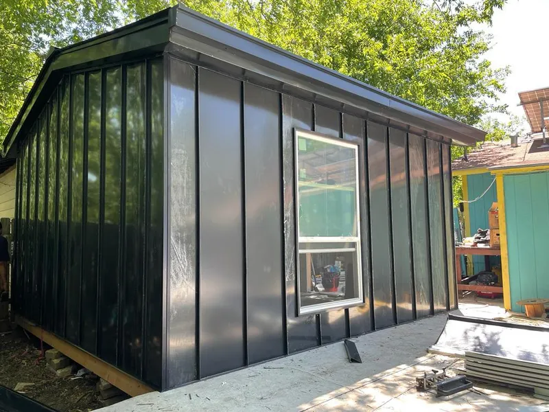 Black standing seam metal wall panels for Roof Inspection in Waseca